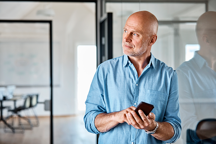 Man in office on the phone
